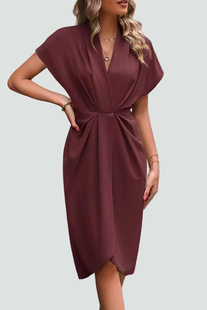 Sophisticated women's midi wrap dress, elegant V-neck style, perfect for flattering special occasion wear.