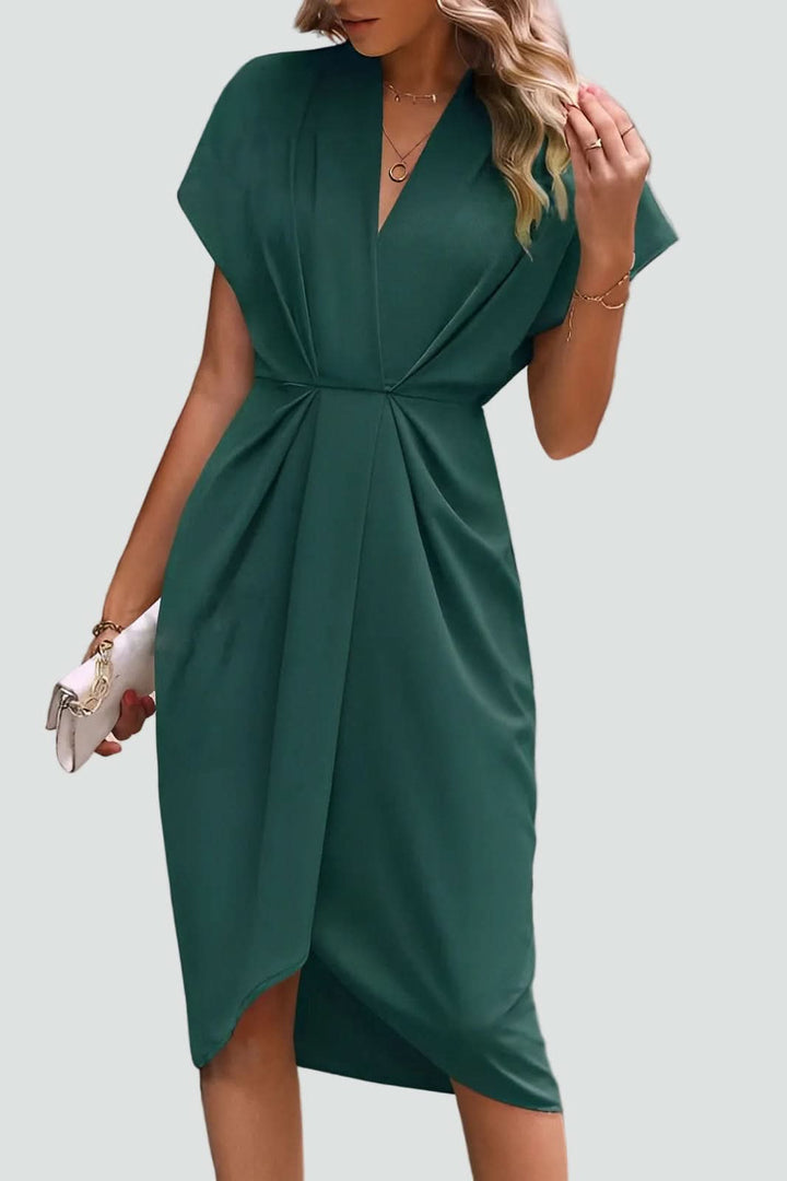 Flattering women's midi wrap dress, elegant silhouette for a sophisticated cocktail or party look.