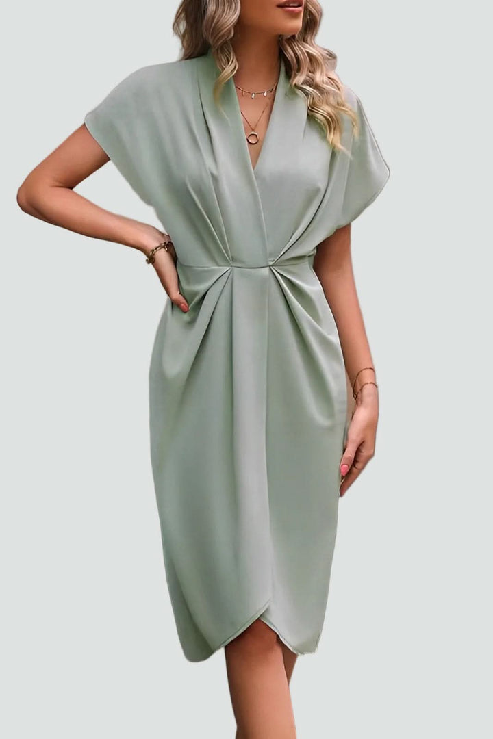 Elegant women's midi wrap dress designed for a flattering fit, perfect for sophisticated party wear.