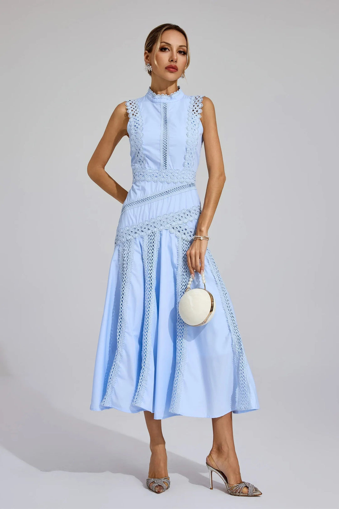 Women's A-line midi dress with delicate lace & mock neck, ideal for wedding guest or formal events.