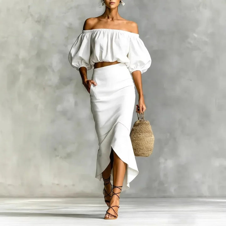 Chic women's off-shoulder two-piece skirt set with puff sleeves & elegant wrap midi for vacation wear.
