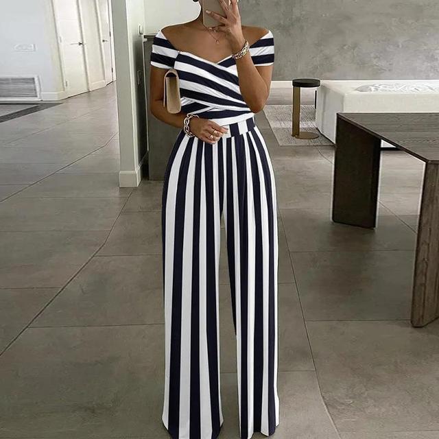 Fashionable women's off-shoulder jumpsuit featuring a vibrant floral print and comfortable wide-leg silhouette.