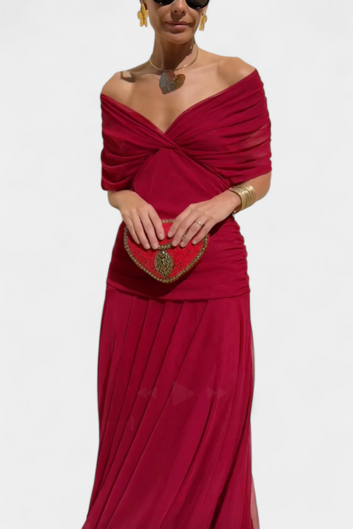 Luxurious off-shoulder maxi dress for women. Elegant formal evening wear gown with chic draped neckline.