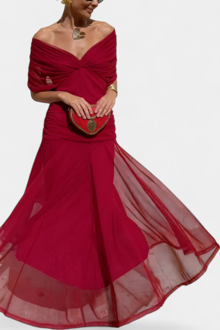 Elegant women's maxi dress with a flattering draped off-shoulder neckline. Long formal gown for evening events.