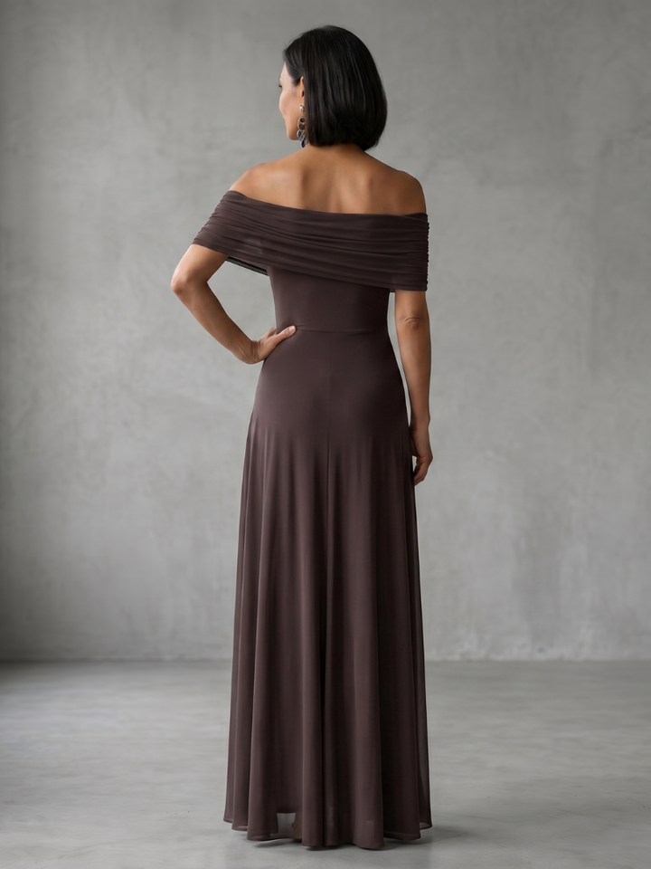 Green off-shoulder midi dress, elegant draped bodice. Stylish women's evening wear for formal events.
