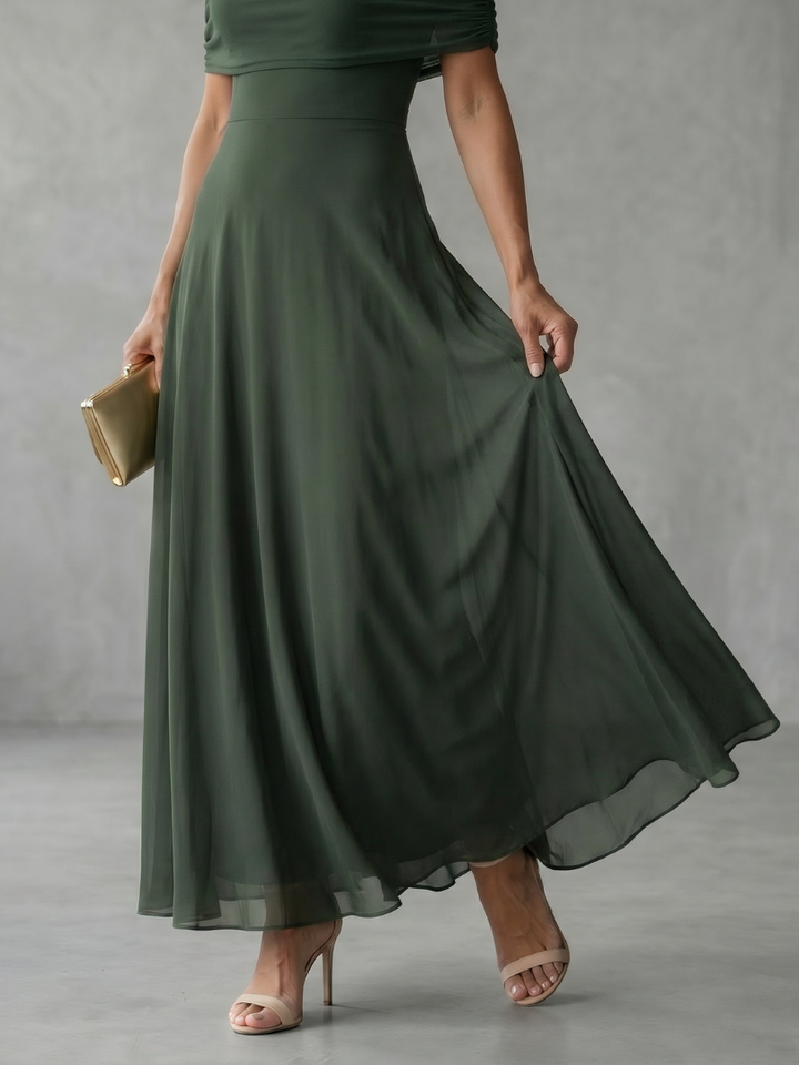 Women's formal coral pink off-shoulder midi dress with elegant draped bodice. Perfect for weddings.