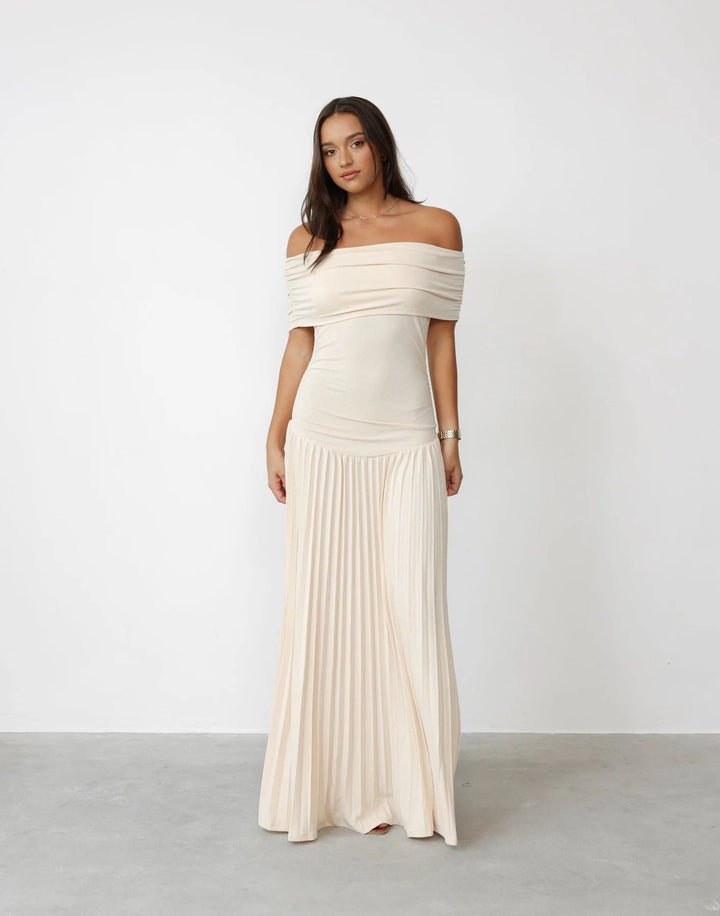 Elegant women's off-shoulder pleated maxi dress. Perfect for wedding guests & formal events.