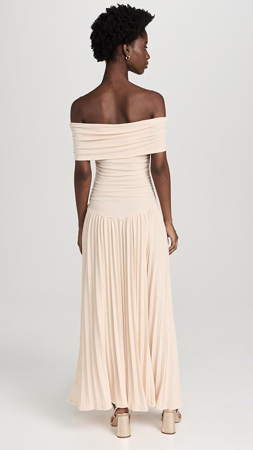 Navy women's off-shoulder pleated maxi dress. Sophisticated choice for wedding guests.