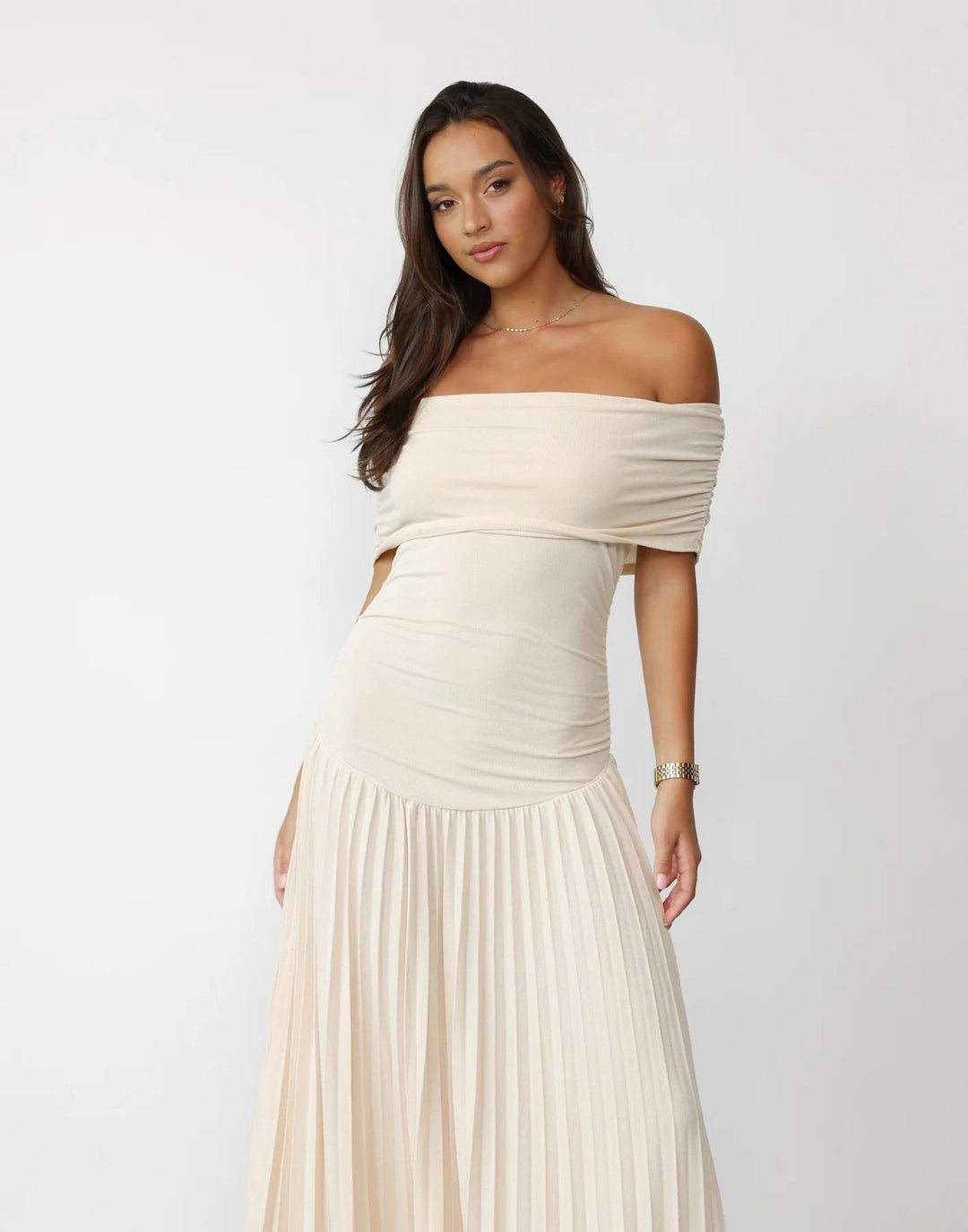 Formal sky blue off-shoulder pleated maxi dress. Ideal for elegant parties and gatherings.