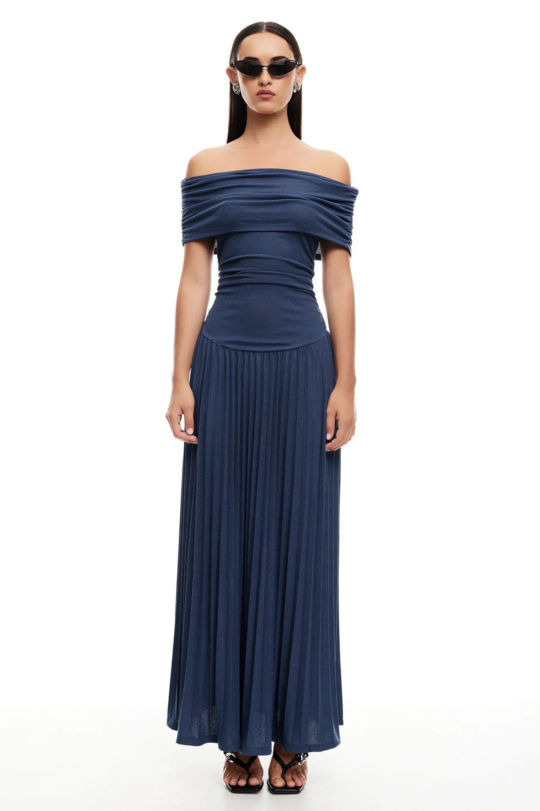 Elegant pleated off-shoulder maxi dress. Perfect for women attending weddings or galas.