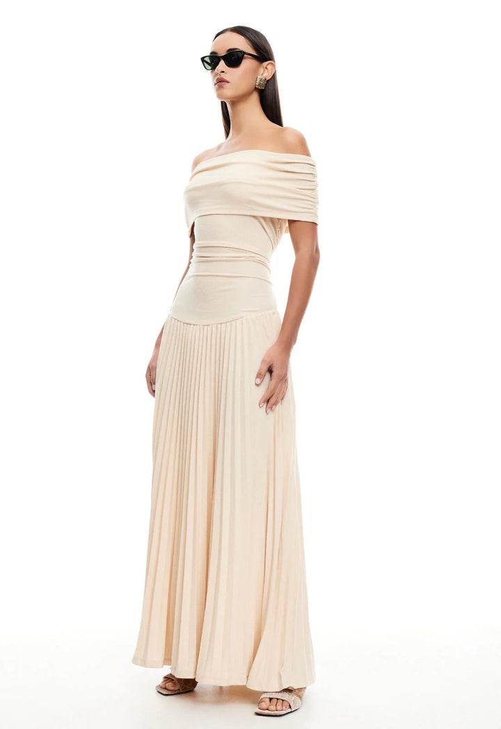 Navy off-shoulder pleated maxi dress. A chic and formal choice for special events.