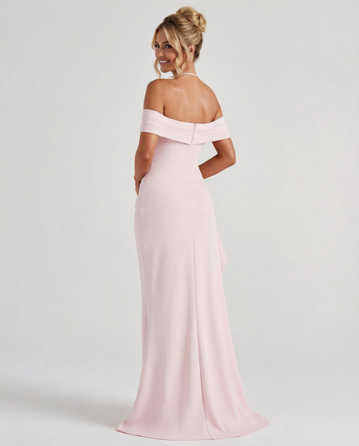 Women's flattering ruched bodycon maxi dress with off-shoulder neckline. Elegant formal party attire.