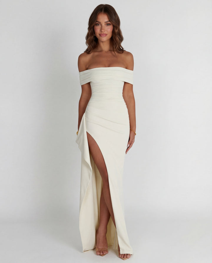 Stunning women's off-shoulder evening dress. A ruched bodycon maxi gown, perfect for formal events.