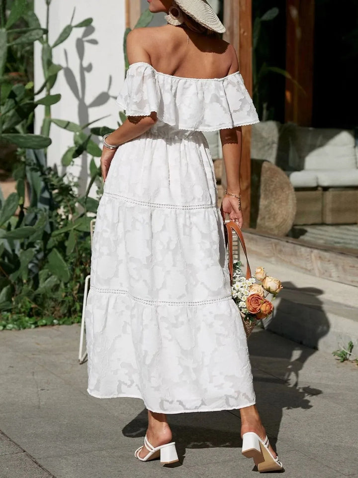 Delicate lace trim detail on an elegant women's off-shoulder ruffle maxi dress, suitable for evening wear.