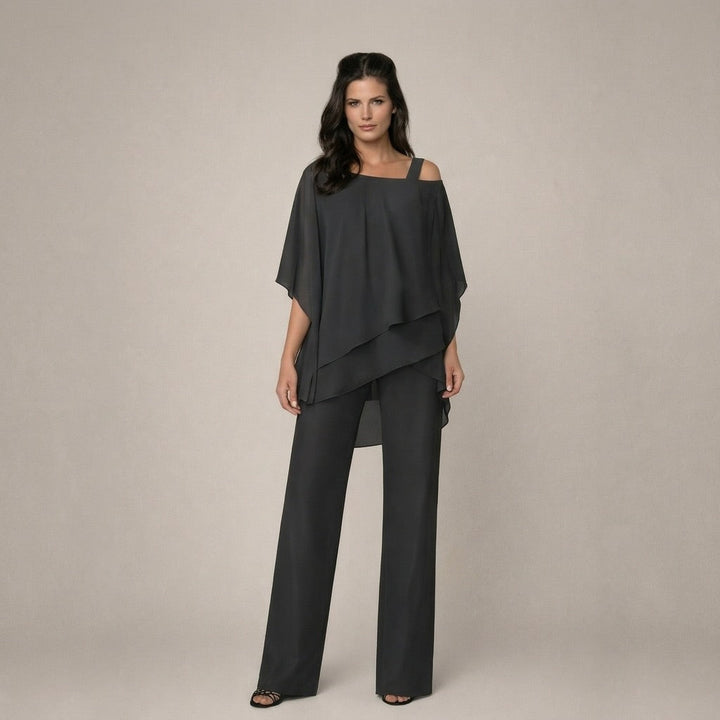 Chic women's off-shoulder top & wide-leg pants matching set. Stylish two-piece ensemble for an elegant summer look.