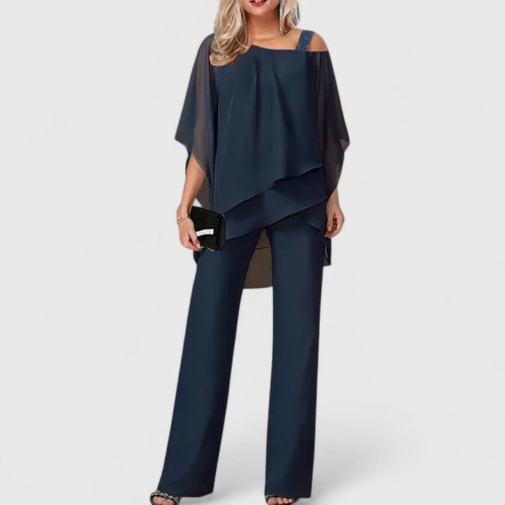 Elegant women's two-piece formal set with off-shoulder top and wide-leg trousers, perfect for evening wear.