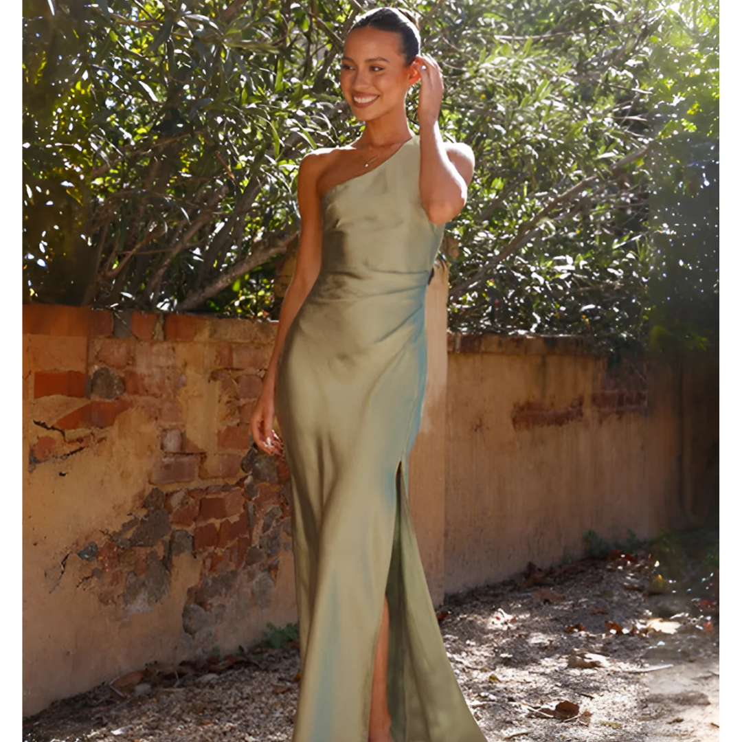 Sophisticated one-shoulder formal gown for wedding guests & special occasions, featuring a graceful side slit.