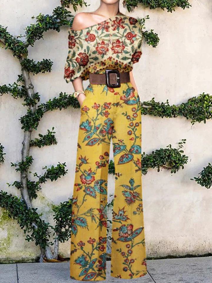 Modern women's one-shoulder printed wide-leg jumpsuit, a comfortable and chic option for resort or summer wear.