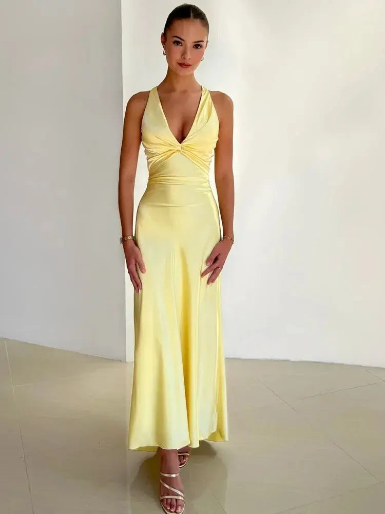 Sophisticated women's summer maxi dress with a comfortable halter neck and striking open back design.