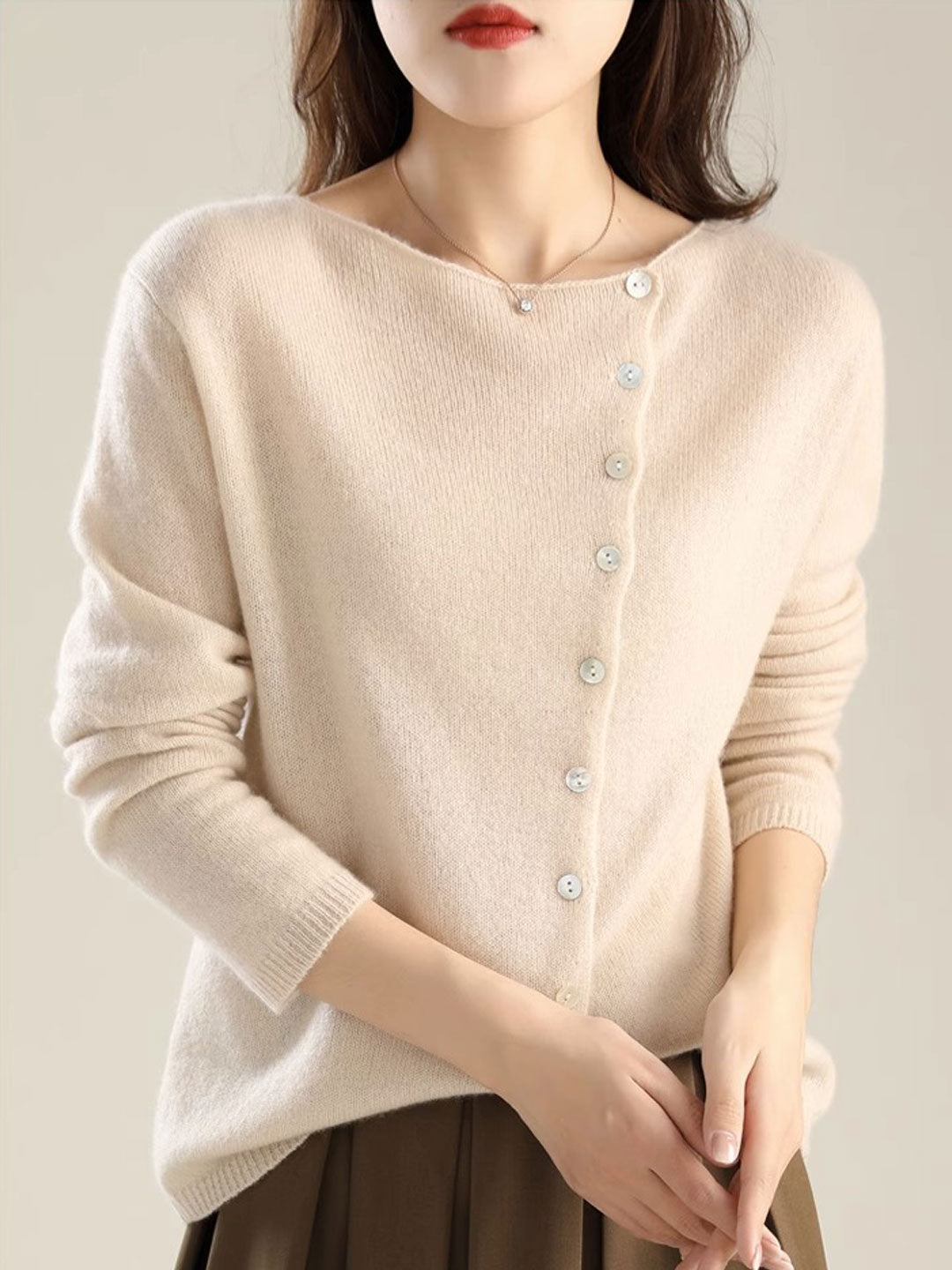 Relaxed fit women's open-front cardigan. Stylish knit for chic, comfortable all-season wear.