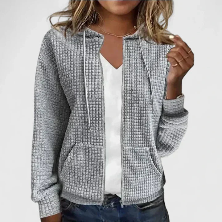 Fashionable women's open front cardigan with a draped design, an elegant and chic layering piece for modern style.