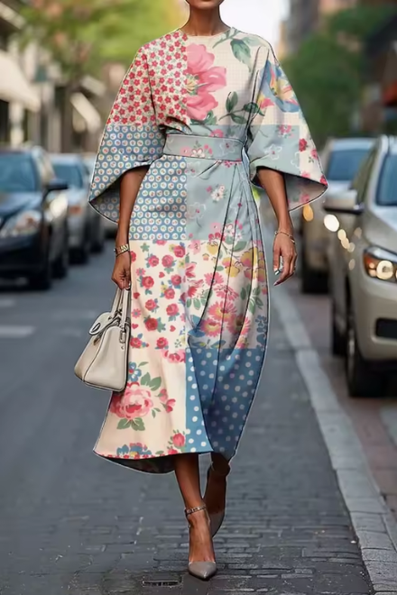 Comfortable women's A-line midi dress with a vibrant painterly floral print & puff sleeves. Great for events.