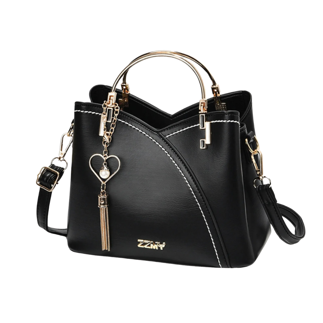 Versatile women's patchwork tote bag, spacious for everyday carry. Features an elegant design & tassel charm.
