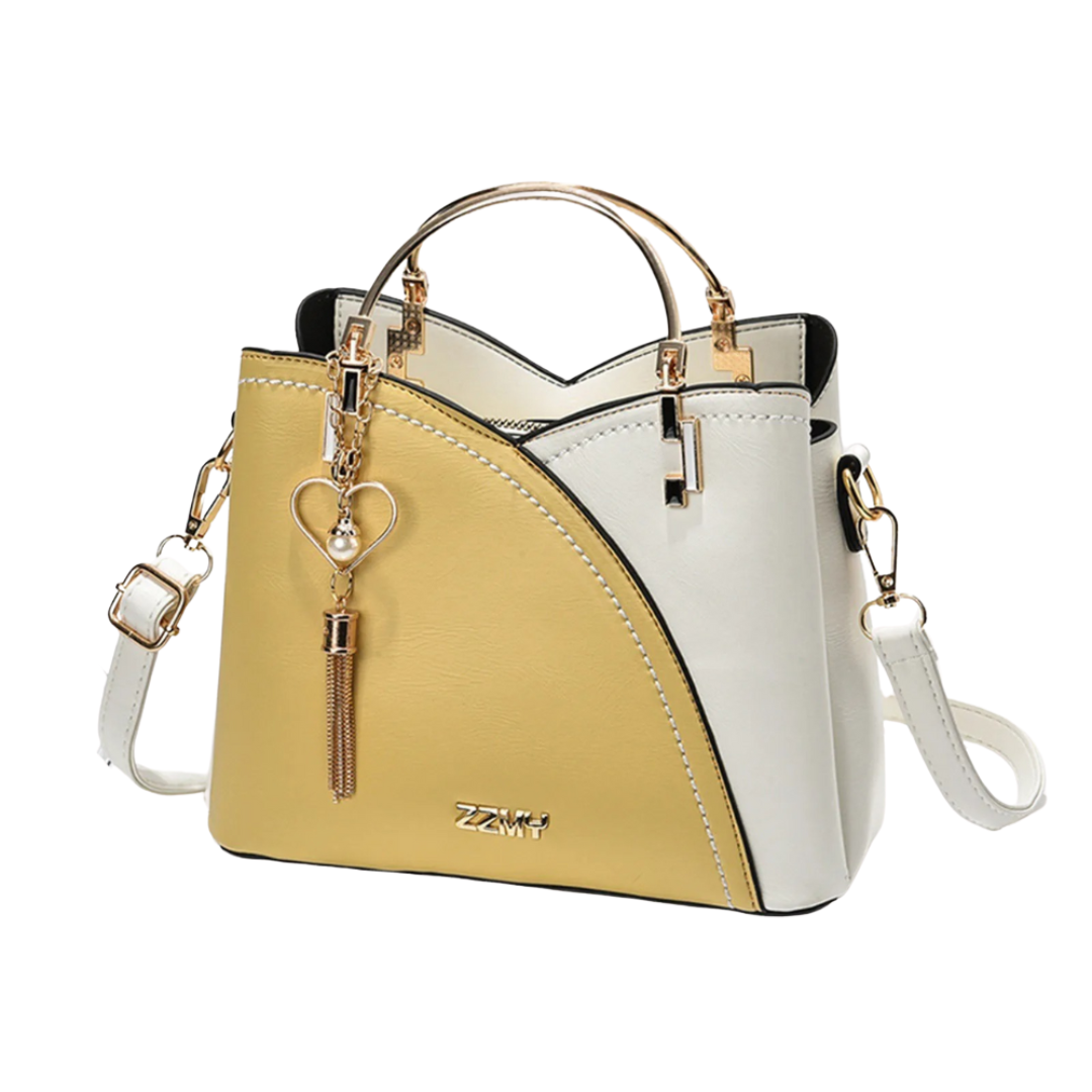 Fashionable women's patchwork tote bag. An elegant everyday accessory with a chic design and tassel charm.