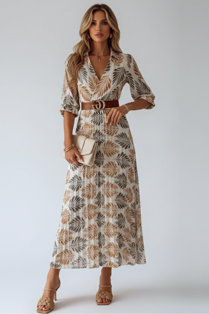 Comfortable women's long maxi dress featuring a stylish pattern & elbow sleeves, ideal for casual summer fashion.
