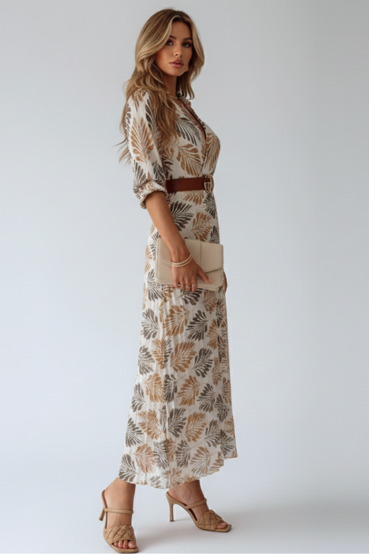 Chic women's patterned maxi dress with elbow sleeves, a versatile and comfortable choice for spring & summer.