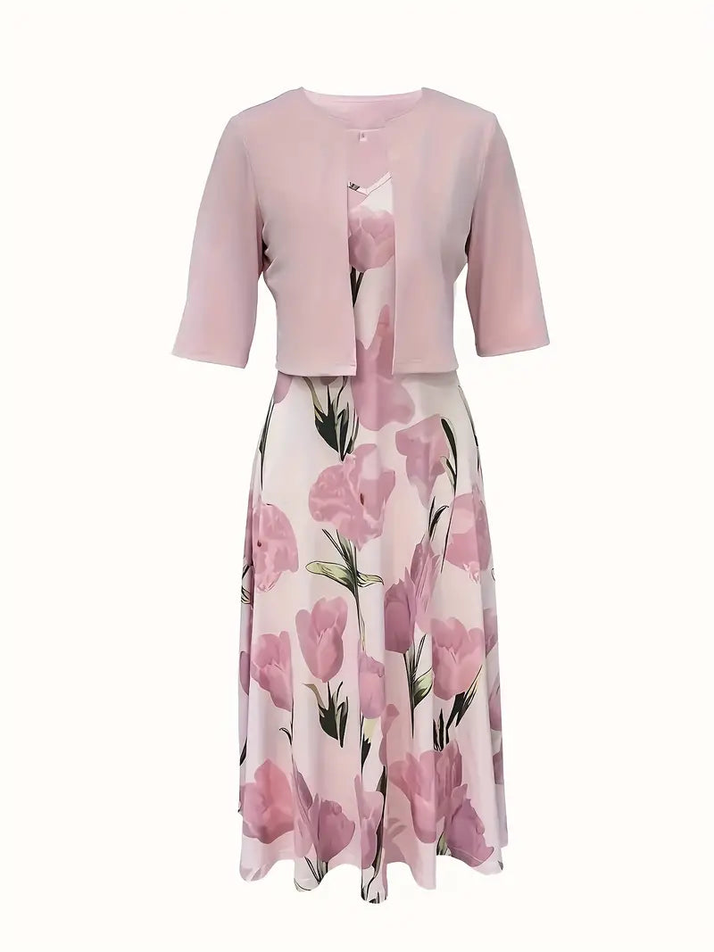 Women's two-piece floral maxi dress in pink with delicate floral print. Ideal for elegant summer outfits.