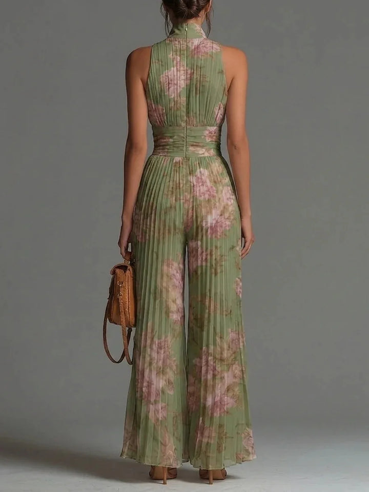 Chic women's floral print pleated halter jumpsuit, ideal for summer parties, vacation, or an elegant outfit.
