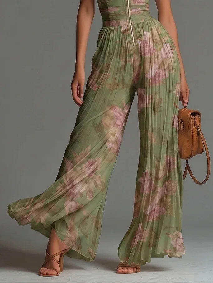 Stylish women's pleated floral halter jumpsuit with a comfortable wide-leg cut, great for summer fashion.