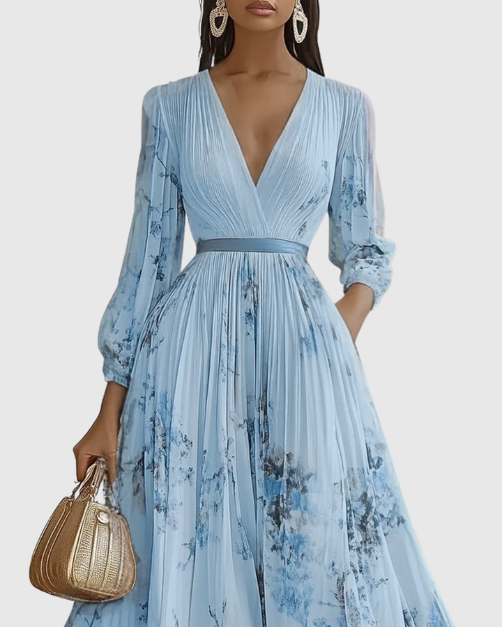 Spring fashion: Women's floral pleated maxi dress with long sleeves and a flattering V-neck.