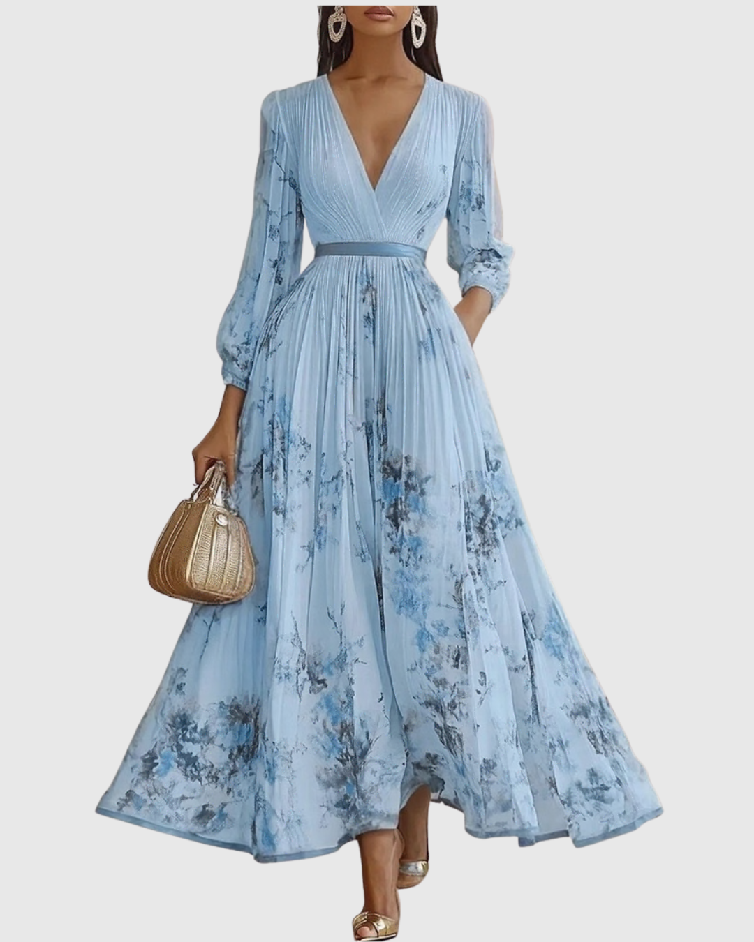 Chic women's flowy maxi dress, featuring long sleeves, elegant pleats, and a floral pattern.