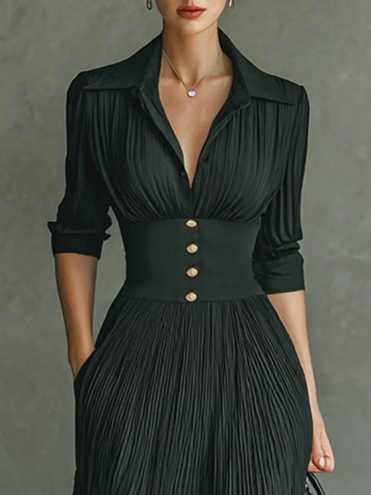 Fashionable women's formal pleated maxi dress, highlighting the chic lapel and elegant fabric texture.