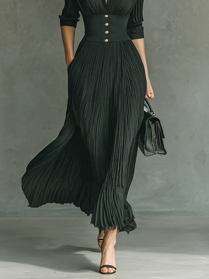 Stylish women's belted waist maxi dress with long sleeves & pleats, ideal for an elegant & versatile style.