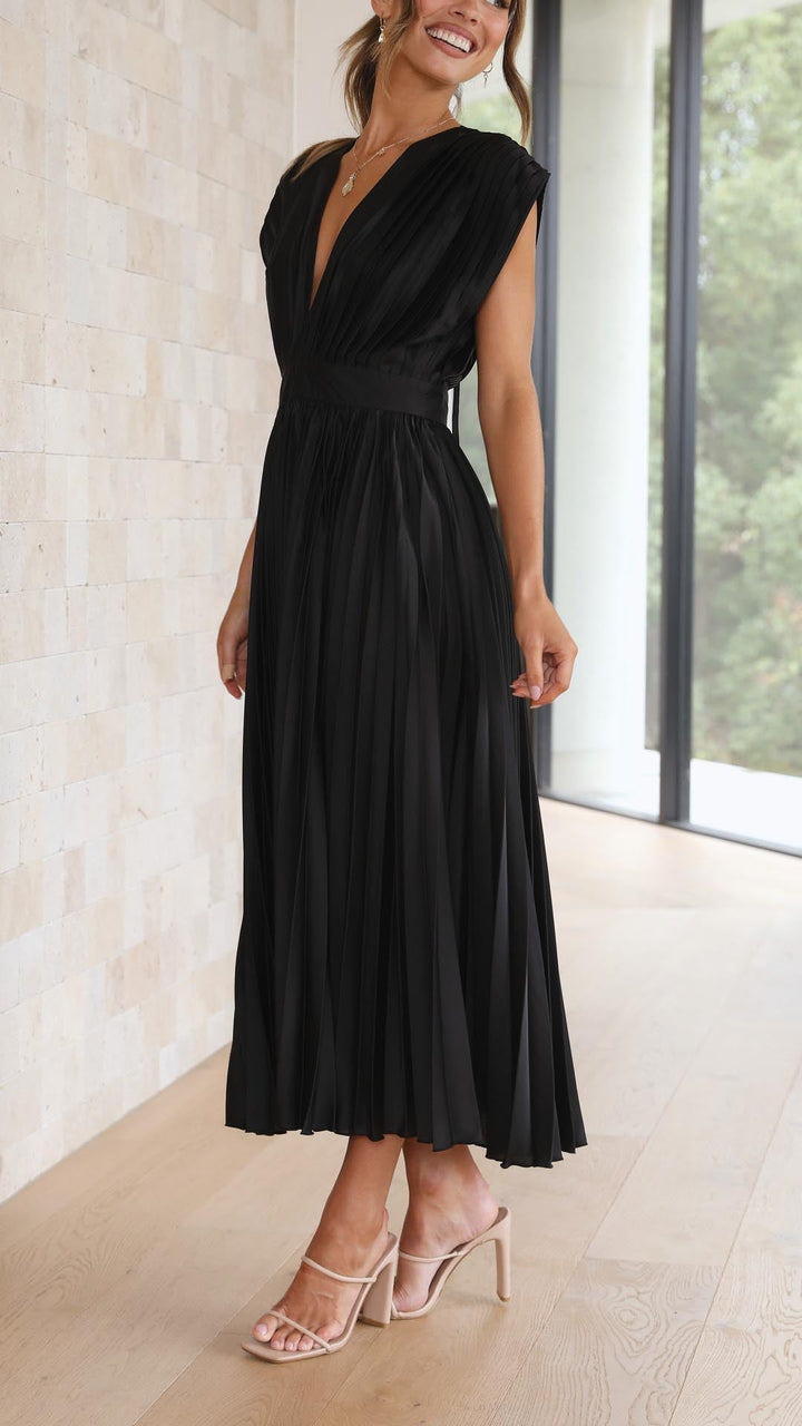 Beautiful pleated V-neck women's gown, perfect as a wedding guest or formal evening dress.