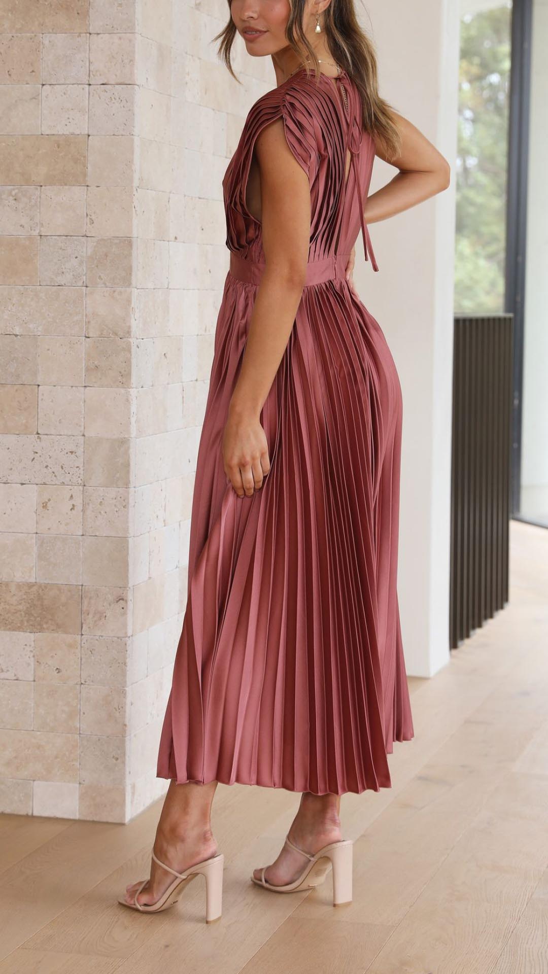 Beautiful sleeveless pleated evening dress for women, deep V-neck, a chic party gown.