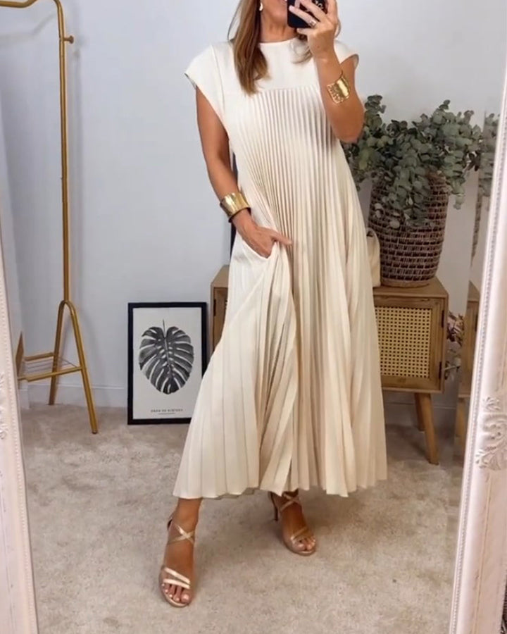 Women's elegant maxi dress, featuring a comfortable flowing design & stylish pleats for versatile fashion.