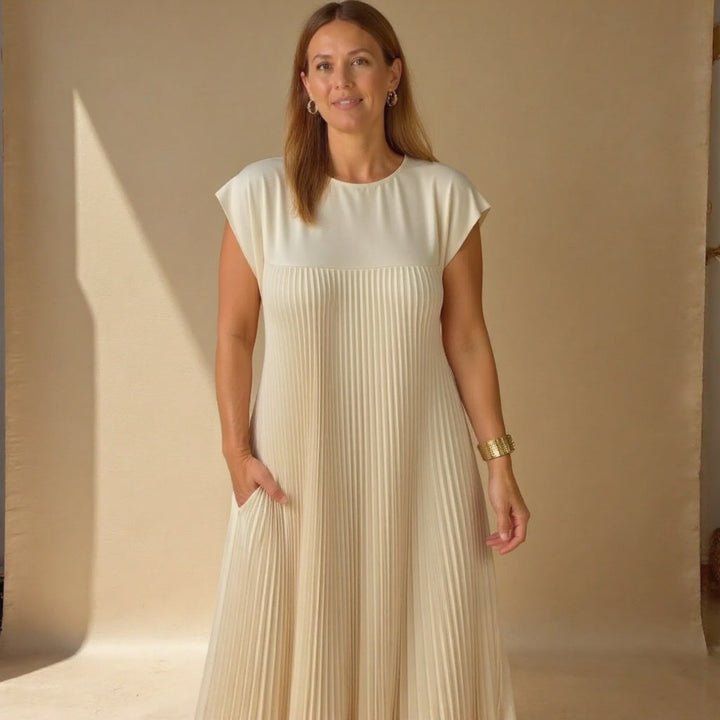Beautiful women's maxi dress with elegant pleats, a flowing & comfortable choice for summer fashion.