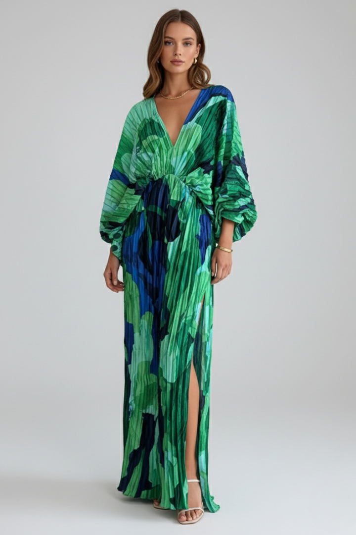 Flowy green women's pleated maxi dress with V-neckline, side slit; comfortable for daytime chic or summer events.