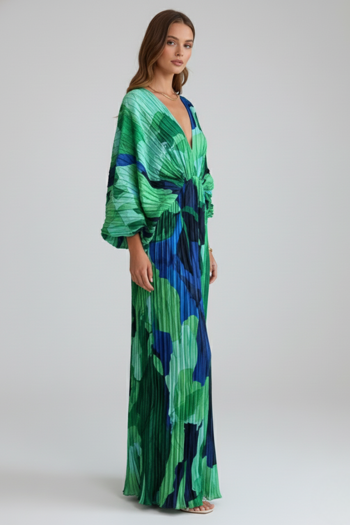 Chic women's V-neck pleated maxi dress featuring a stylish side slit, ideal for elegant evening or daytime wear.