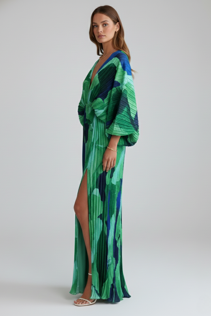 Beautiful women's pleated maxi dress with a flattering V-neck and trendy side slit, perfect for any season.