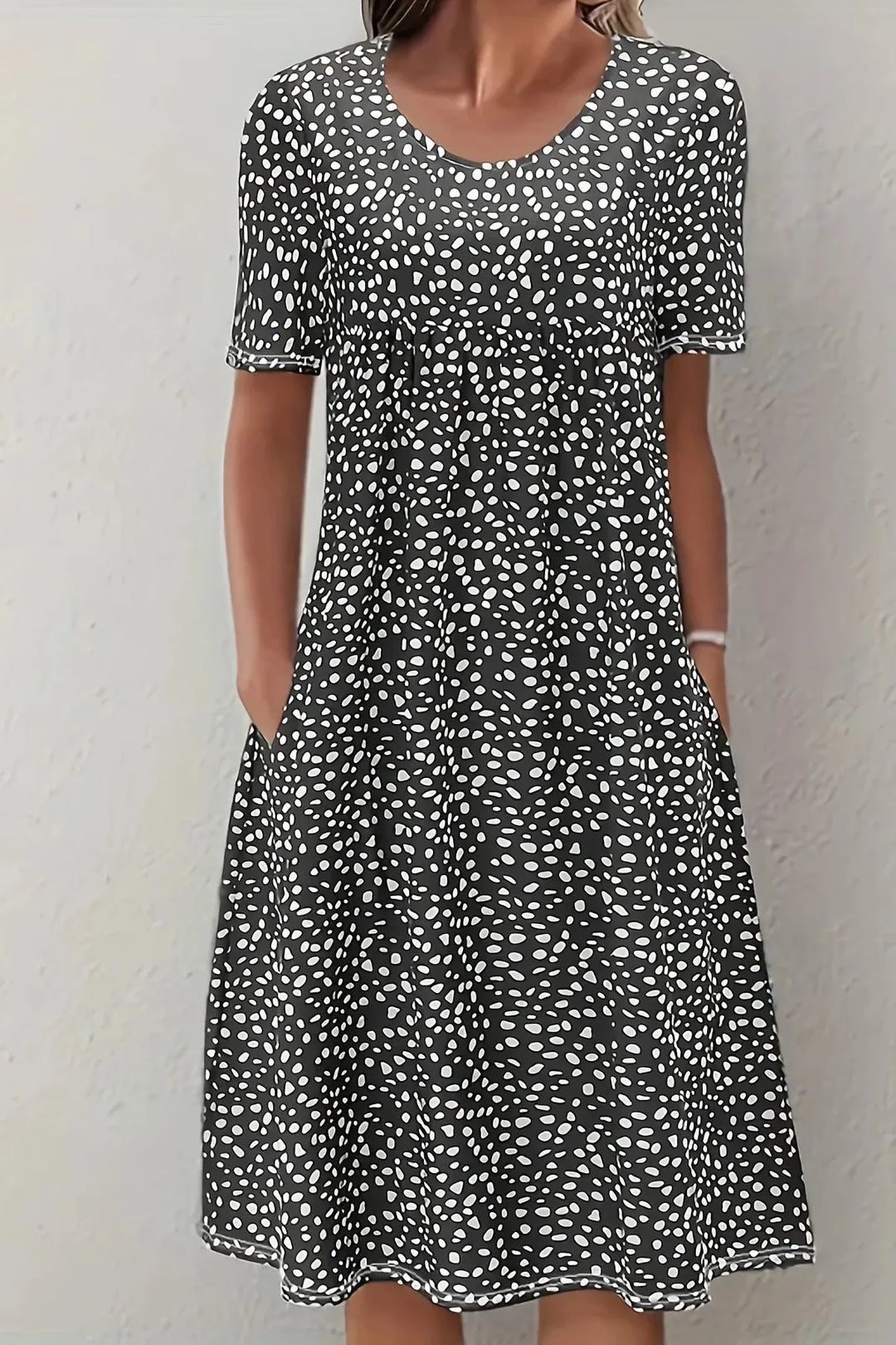 Sophisticated Women's Midi Dress with pleated waist, accentuating the figure. Ideal for formal and evening wear.