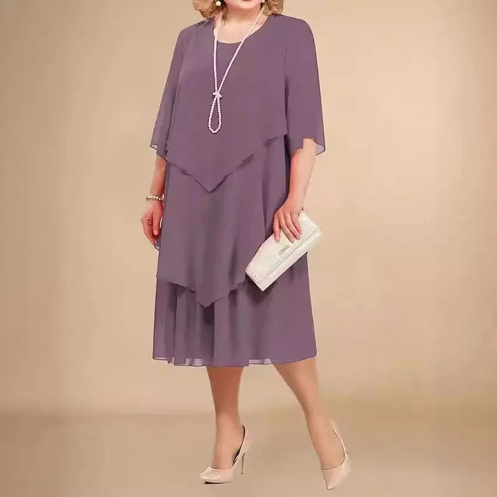 Flowy plus size women's asymmetrical midi dress, ideal for parties, special occasions, and formal events.
