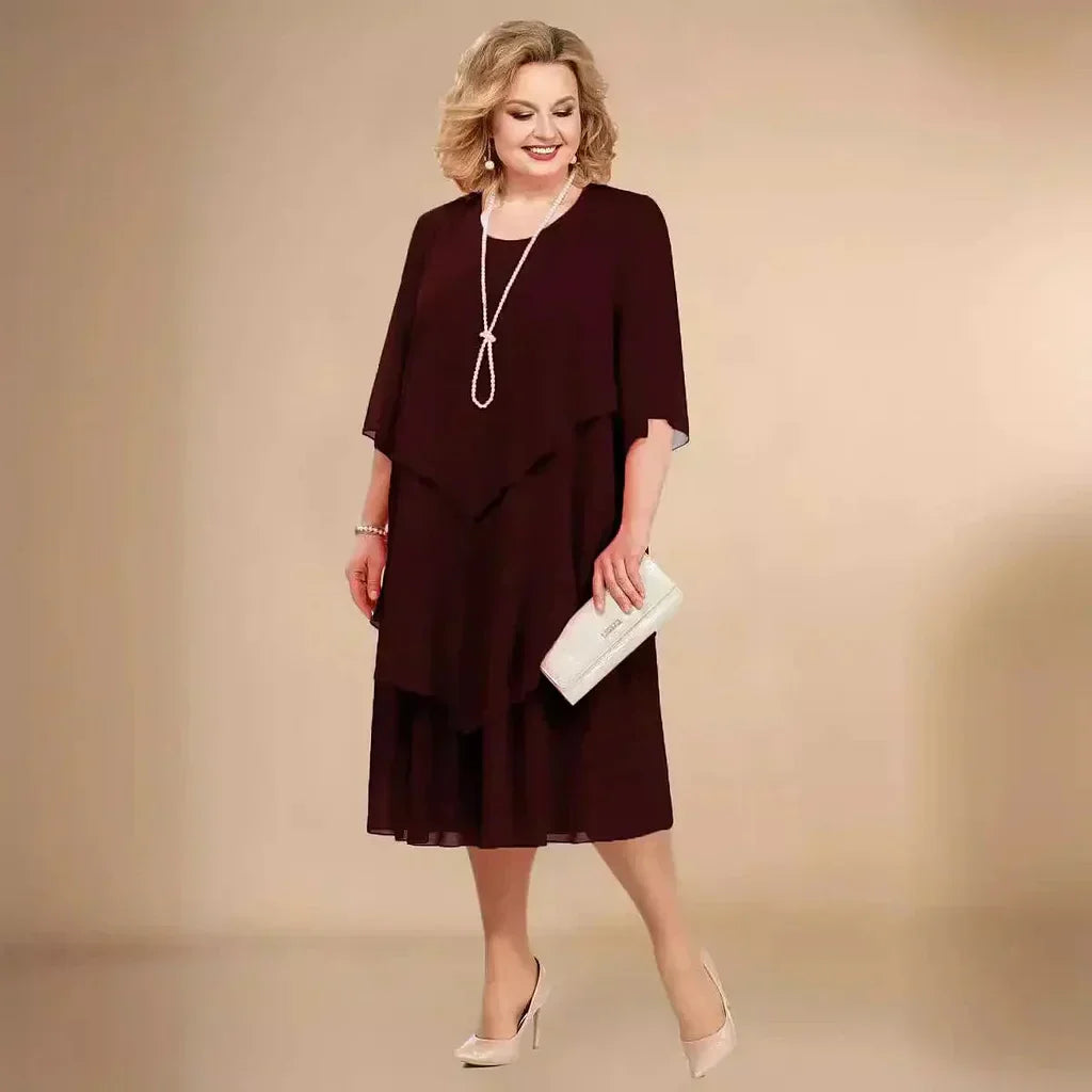 Stylish plus size women's asymmetrical hem midi dress, a versatile choice for any formal or special occasion.