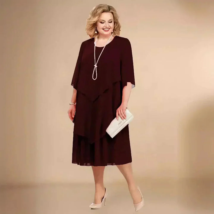 Stylish plus size women's asymmetrical hem midi dress, a versatile choice for any formal or special occasion.