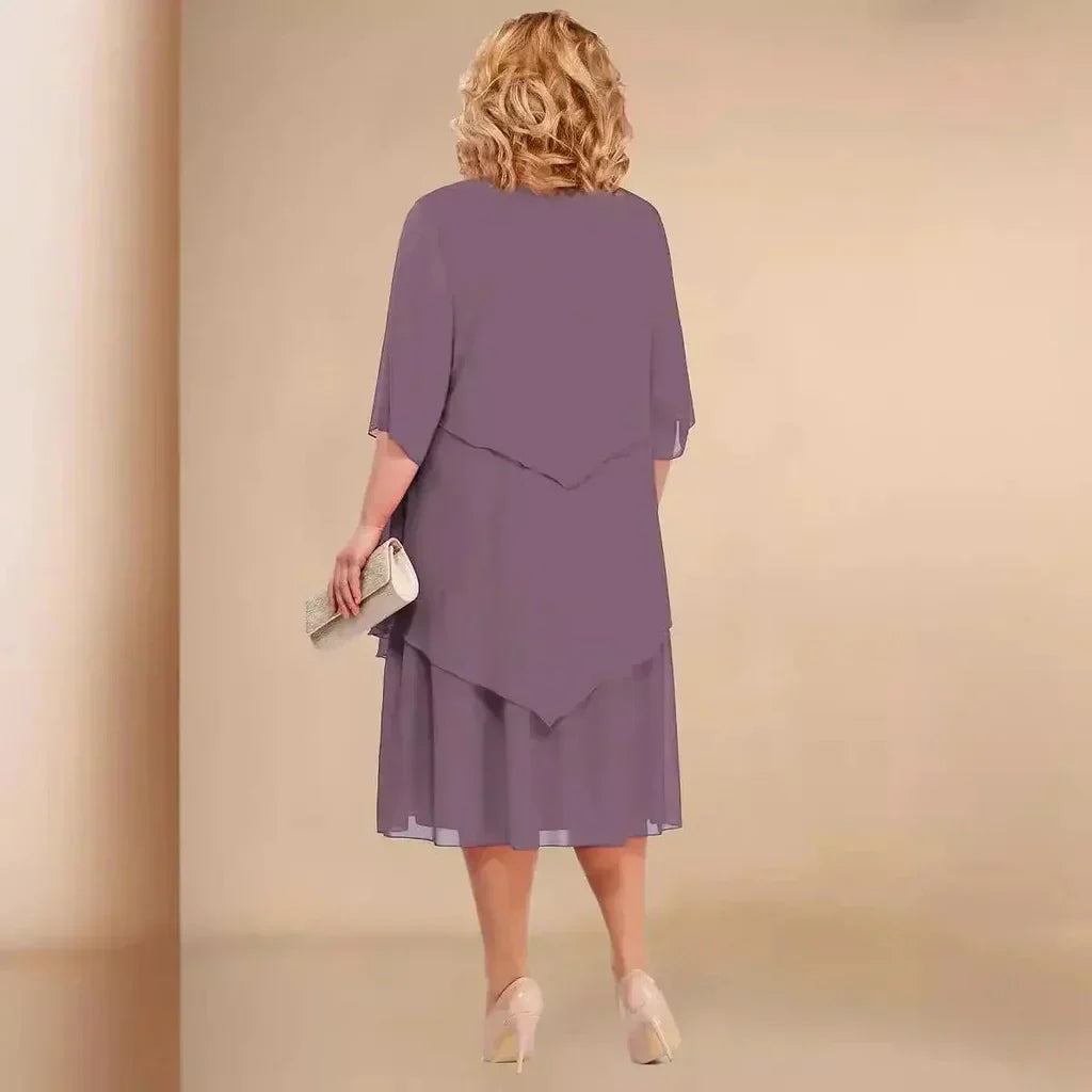 Beautiful plus size women's formal midi dress with an asymmetrical design, comfortable for elegant evening events.
