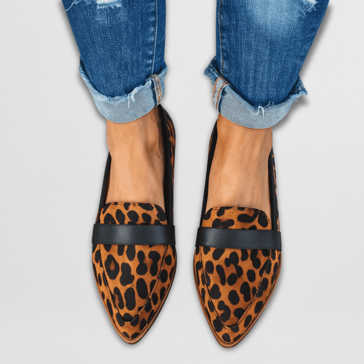 Versatile women's pointed-toe flat loafers, offering a chic slip-on style for work and casual wear.